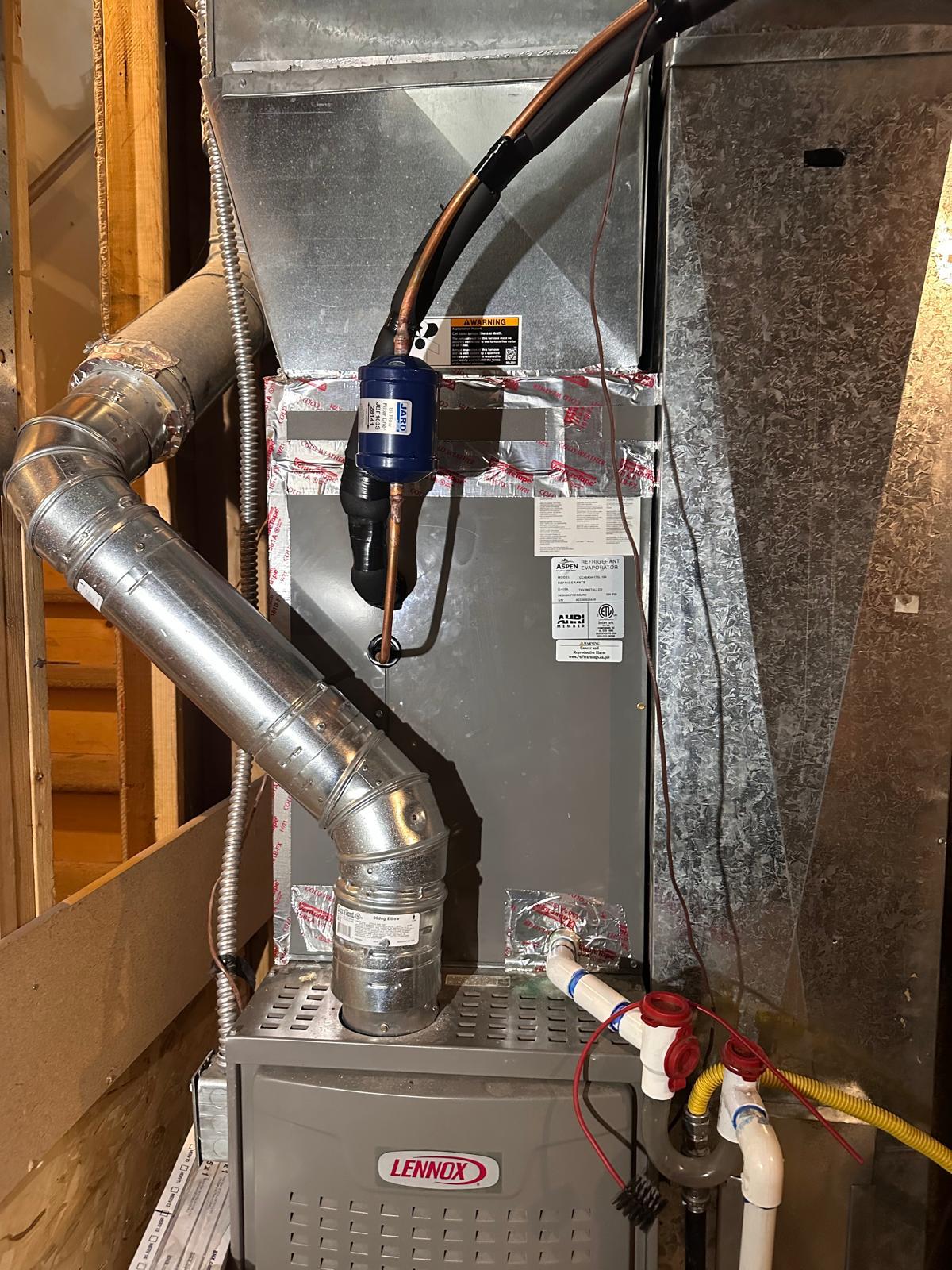 Mountain Star technician's furnace coil and filter drier installation, clean and tidy