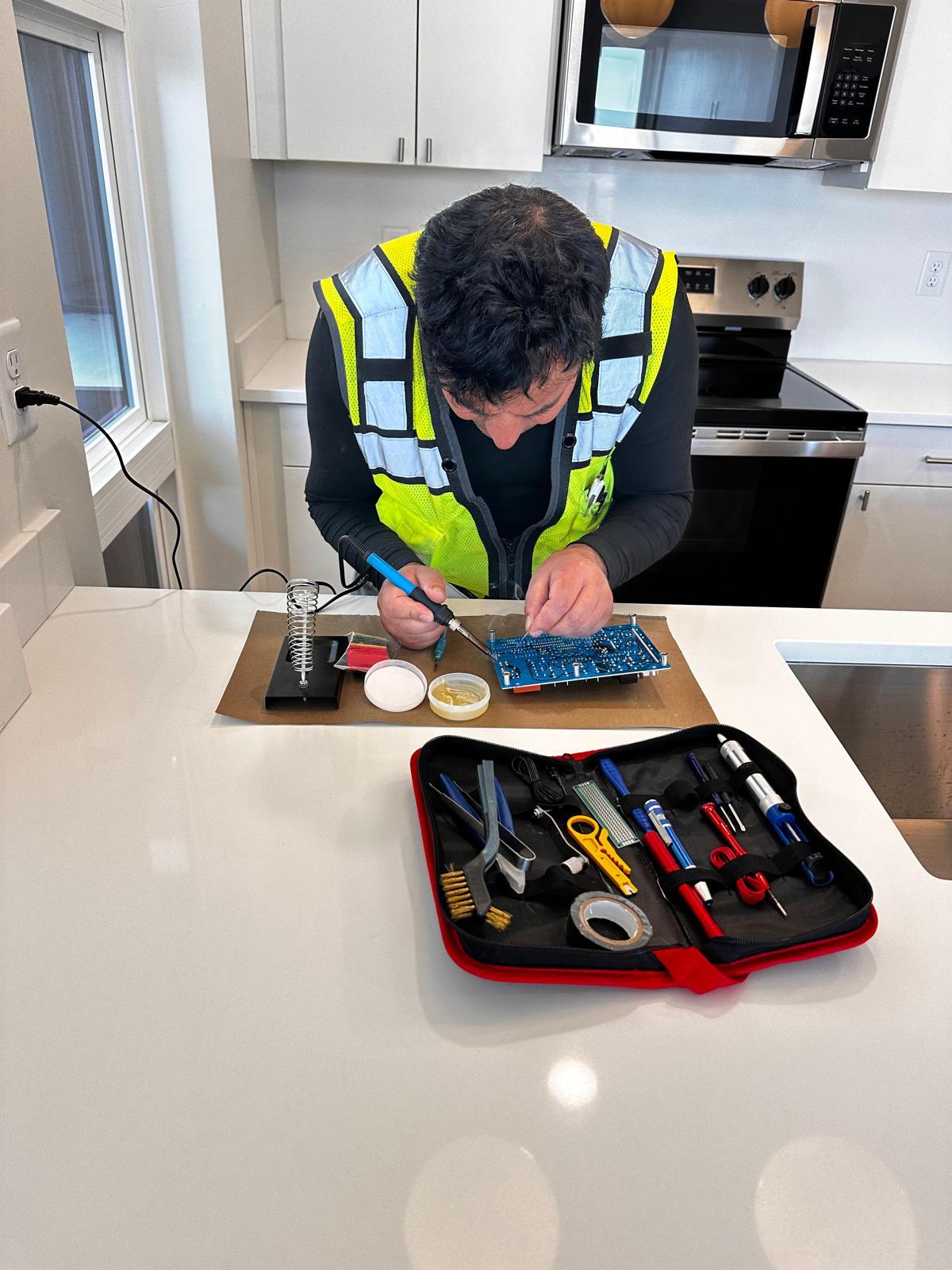Mountain Star technician repairing a control board